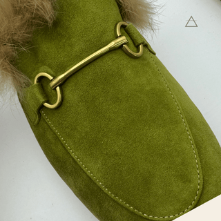 Garance™ gold horsebit detail on olive suede — craftsmanship close-up — Studio Vespria